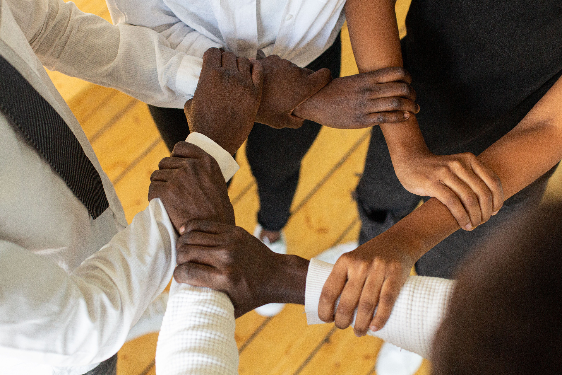 Hands joined together in partnership